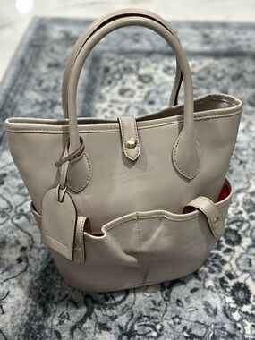 Dooney & Bourke Cream Leather Tote with Red Lining